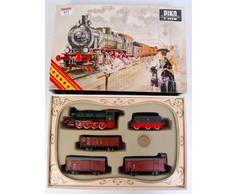 A Piko H0 Landerbahnzug 1913 goods train pack containing green KPEV 0-8-0 engine and tender and 3 wagons, with instructions (