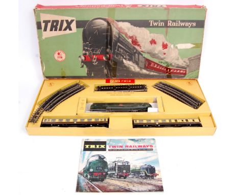 A Trix Twin Railway train set containing BR green Warship class diesel locomotive 'Vanguard', 2 WR brown/cream coaches and tr
