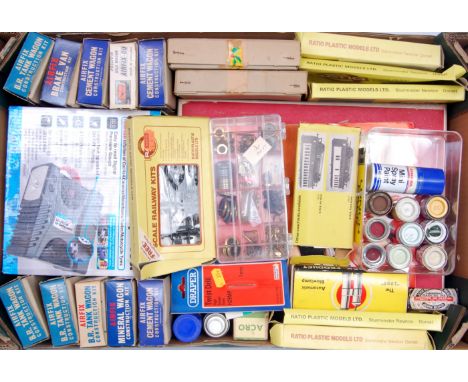 Two large trays of part made kits, fittings, wheels, motors, electric 12v motors, Hobbies Ltd fret set etc, a delve (a/f) all