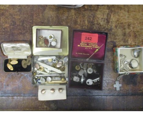 A selection of silver gilt metal and costume jewellery to include cuff links, studs, a silver ring A/F, a gold plated propell