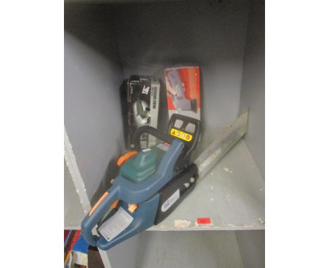 A Performance 33cc chain saw, a boxed Power Base angle grinder 600w 115mm, and a boxed Performance 180w detail sanderLocation