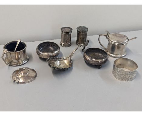 Mixed silver to include cruets, napkin ring, decorative spoon with embossed picture of a Windmill and othersLocation: cab 