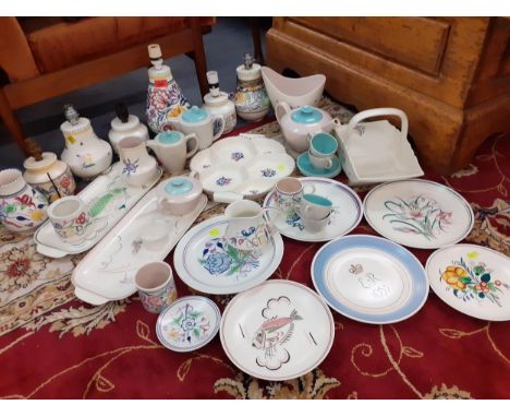 Mixed Poole pottery to include an hors d'oeuvre dish, and fish plates and seven table lampsLocation: 