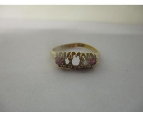 An 18ct gold ring inset with rubies and diamonds, 2.6gLocation: 