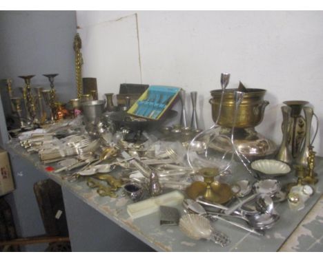 A selection of silver plate, white metal and brassware to include a Dutch style white metal spoon, mixed flatware, toasting f
