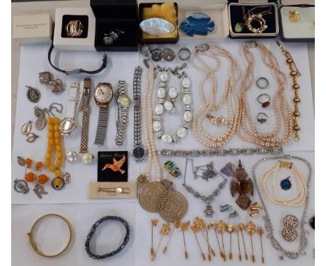 Vintage costume jewellery to include faux pearl necklaces, gold tone stick pins, fashion rings, a silver and black jet pendan