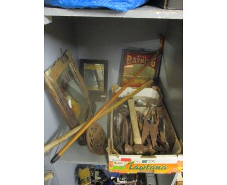 Three framed advertising mirrors, two walking canes, and an assortment of various small hand tools Location: 