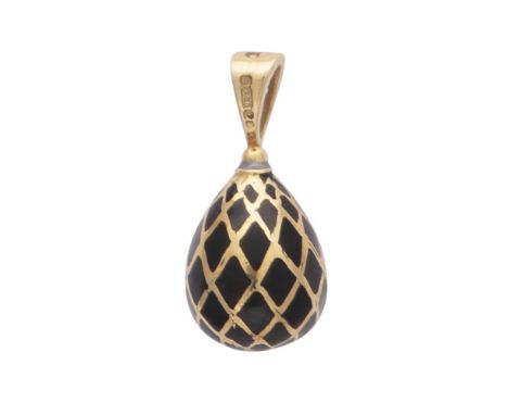 SARAH FABERGE - A contemporary enamelled egg pendant in 18ct yellow gold by Sarah Faberge, designed as an egg with black enam