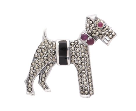 A jewelled novelty dog brooch in sterling silver, modeled as a Scottie dog, with black enamel decoration, jewelled with marca