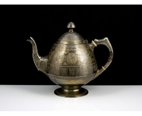 An antique Victorian Scottish Sterling Silver teapot by William Marshall, Edinburgh 1877. The rounded body with bright cut en