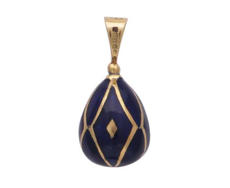 SARAH FABERGE A contemporary enamelled egg pendant in 18ct yellow gold, by Sarah Faberge, designed as an egg with midnight bl