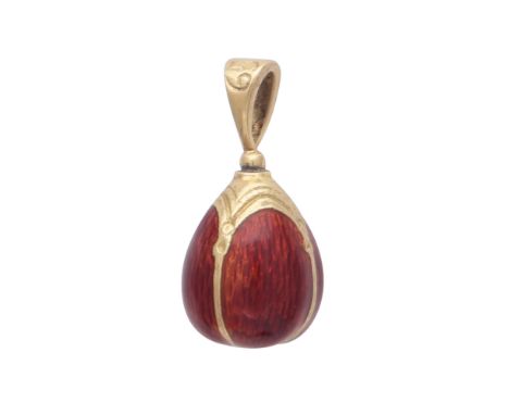 SARAH FABERGE A contemporary enamelled egg pendant in 18ct yellow gold by Sarah Faberge, designed as an egg with red enamel d