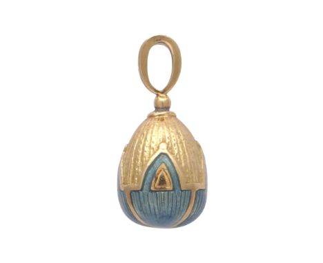 SARAH FABERGE - A contemporary enamelled egg pendant in 18ct yellow gold by Sarah Faberge, designed as a textured egg with pa