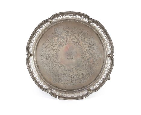 A Victorian silver circular salver, by Henry Wilkinson &amp; Co Ltd,with shaped beaded and pierced border and engraved with f