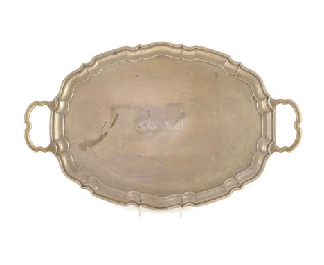 A 1930's silver two handled oval tea tray, by Viner's Ltd,with engraved inscription, 57cm, Sheffield, 1936, 55.5oz.Quite tarn