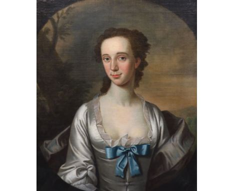 Early 18th century English School Half length portrait of a lady within a landscapeoil on canvas74 x 62cmOil on canvas reline