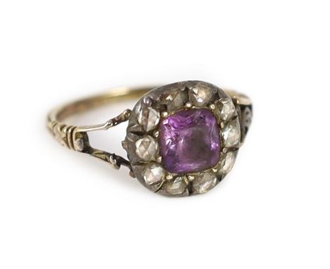 A Georgian gold, foil backed amethyst and rose cut diamond set cluster ring,size J/K, gross weight 3.4 grams.Piece of gold on