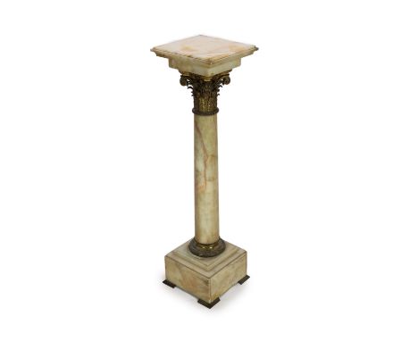 An Edwardian ormolu mounted onyx pedestal,with square top, corinthian capital and block base,W,32cm H.117cmOverall in fair co