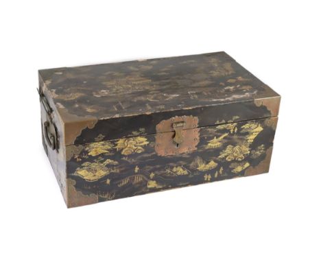 A Japanese lacquer fitted travelling trunk, 19th century,black and gilt decorated with figures in a river landscape with pavi