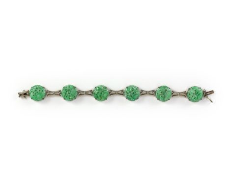 A mid 20th century 9ct white gold and jadeite set bracelet, in original Liberty &amp; Co. fitted box,each of the six circular