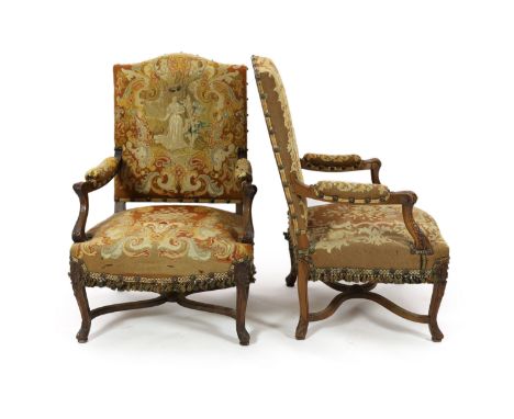 A pair of 19th century French walnut fauteuilswith scroll frames and part needlework upholsteryW. 75cm. D. 78cm. H. 112cm.Som