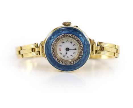 A lady's early to mid 20th century 18ct gold, enamel and diamond chip set manual wind wrist watch,case diameter 26mm, gross w