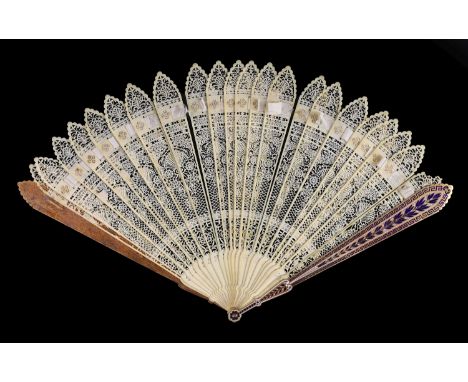 A German or Swiss gold, enamel and ivory brise fan, 19th century, possibly made for the Ottoman market,the gold guards finely