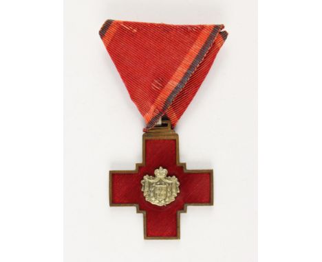 Ehrenzeichen des Roten Kreuz, gestiftet 1876. Kreuz Bronze emailliert, 40mm, am Dreiecksband (verfärbt).  - Zustand II
