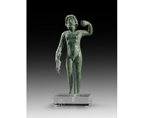 Zeus. Römisch, 1. - 3. Jh. n. Chr. H 13,2cm. Vollguss. Zeus mit Blitzbündel in der gesenkten Rechten, die erhoben Linke war e
