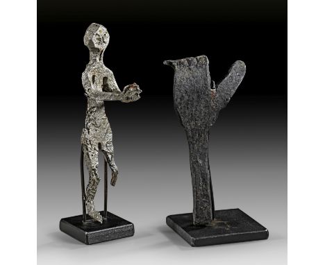Eisenvotive. Niederbayern, Perka bei Kelheim, 15. - 19. Jh. a) H 12cm. Menschliche Figur. Inv. 1937. Gereinigt, ein Untersche
