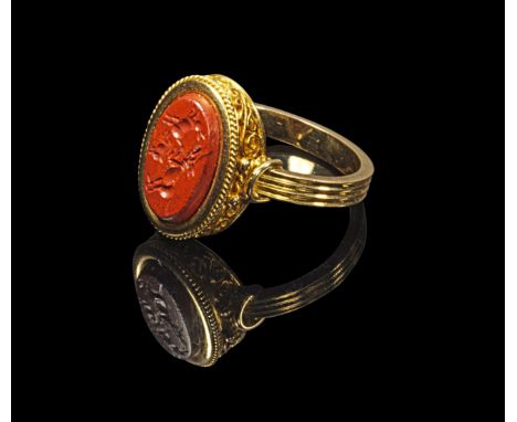 Moderner Goldring mit Jaspis-Gemme. Ring modern, Gemme römisch, 1. - 2. Jh. n. Chr. 6,44g, Ringgröße 58. Moderner Goldring mi