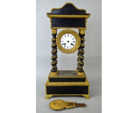 19th century gilt metal and ebonised portico clock, with twin train movement, 52cm x 22cm PROVENANCE: Consigned from a local 