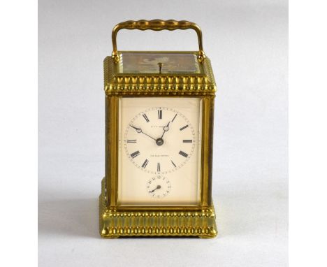 A quarter repeating carriage clock with alarm, in brass Gorge Pagoda case, repeating on two bells, engraved on the back plate