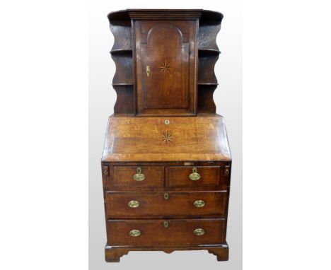 18th century oak fall front bureau with later top with cupboard door flanked by shelves, 178cm x 92cm       Split to arched p