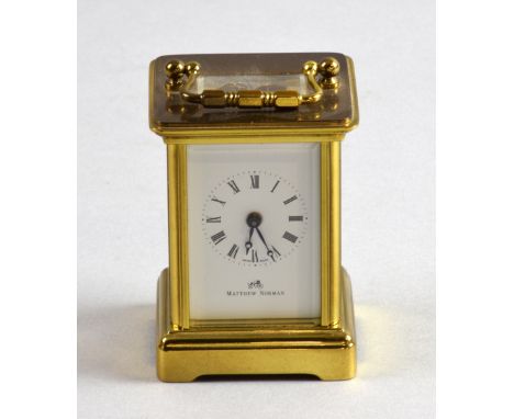 Miniature carriage clock by Mathew Norman, 8.5cm      