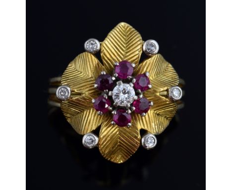 Vintage ruby and diamond flower ring, set with a ruby and diamond cluster to the centre with textured gold petals and further