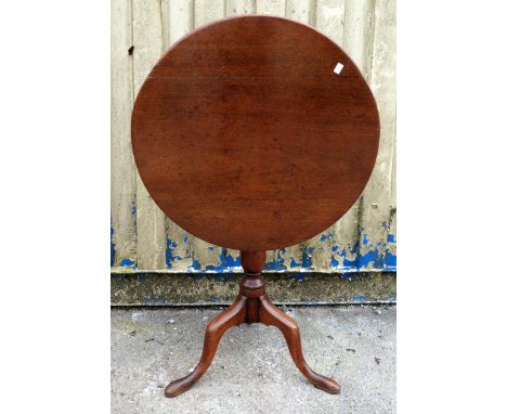 George III mahogany tilt-top table on turned column and tripod base, 73cm x 70cm      