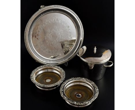 Silver plated three light candelabrum with matching candlestick, pair of bottle coasters, egg cup stand, mugs and other items