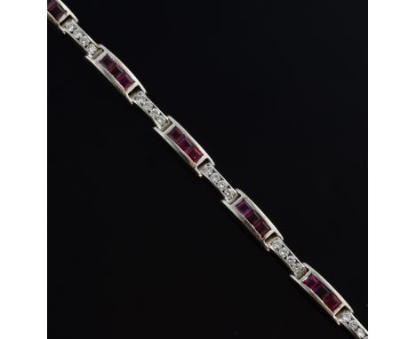 Diamond and ruby set bracelet, the square cut rubies channel set, linked by sections with brilliant cut diamonds, marked 750 