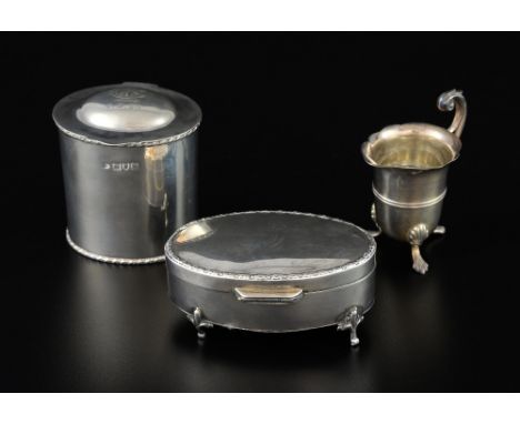 George V silver oval trinket box, by E S Barnsley & Co., Birmingham, 1912, miniature cream jug; and an oval box and cover, 