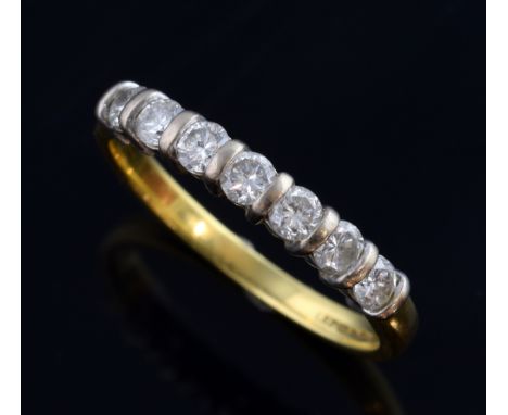 Diamond seven stone ring, in 18 ct gold, estimated diamond weight 0.50 carats.  Ring size M    Gross weight 2.6 grams