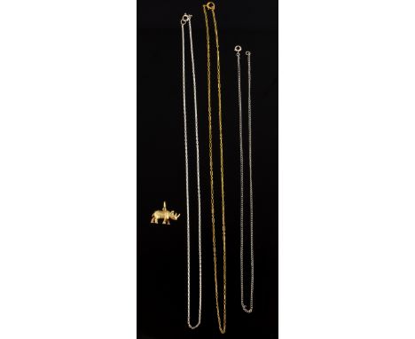 Gold rhino, a white gold chain, 9 ct  and two others unmarked  marked item, 9.2 grams 