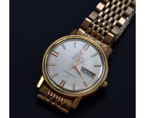 Omega Constellation Automatic chronometer watch, the silvered dial with baton numerals,  day and date aperture at 3, on a gol