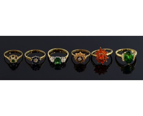 Fire opal cluster ring, two rings with green zircon, and three others, all 9 ct gold  one ring lacking small sapphire, otherw