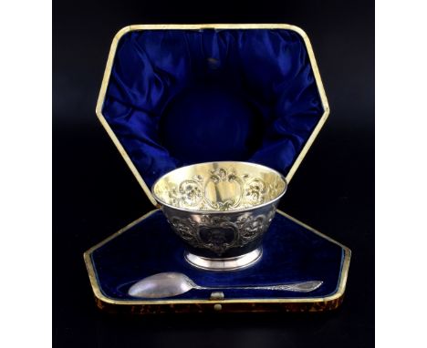 Victorian silver bowl and spoon set, the bowl with embossed floral decoration, the spoon with moulded decoration, by Henry Wi