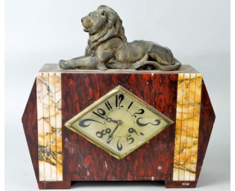 1920's red marble twin train mantel clock, 29 x 35cm PROVENANCE: Consigned from a local deceased estate, the property of a cl