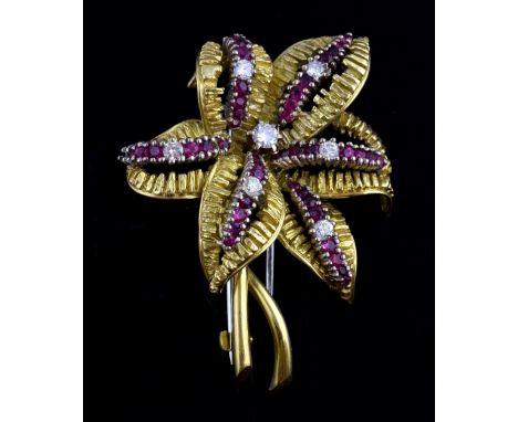 1960's ruby and diamond abstract flower brooch, set with round brilliant cut diamond to the centre weighing approximately 0.3