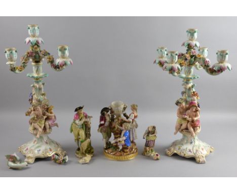 Pair of Meissen candelabra, 47cm high, a Meissen figural group depicting three figures decorating an urn with flowers 20cm hi