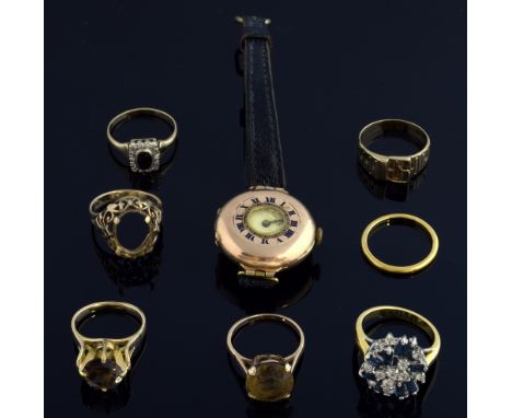 Six gold rings, 22 ct gold wedding band, a sapphire set ring, two with smoky quartz and another lacking stone, all hallmarked