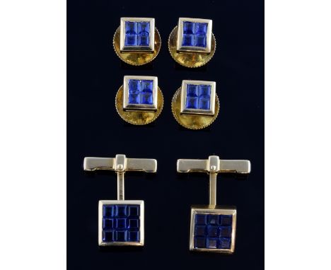 A pair of  gold cufflinks, each set with nine square cut sapphires, and matching shirt buttons inset with four square cut sap